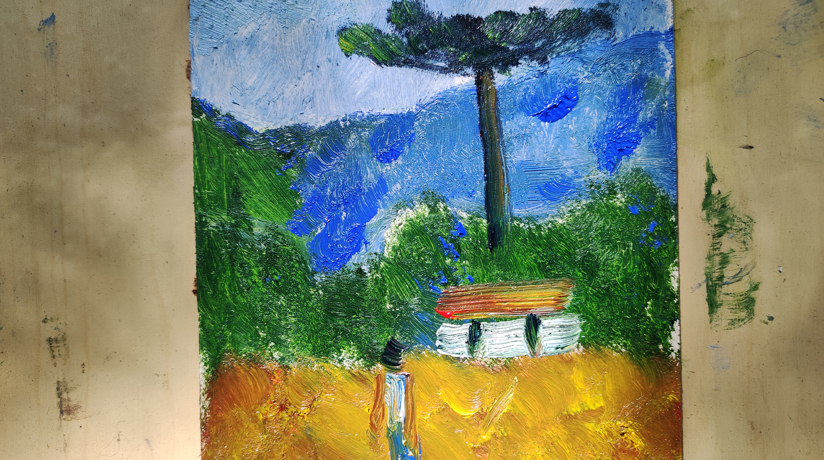 Pintura de uma paisagem feita por aluno 